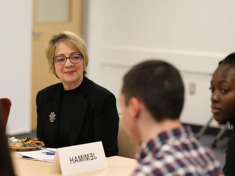 Chancellor Marilyn J. Wells listening to student panel.